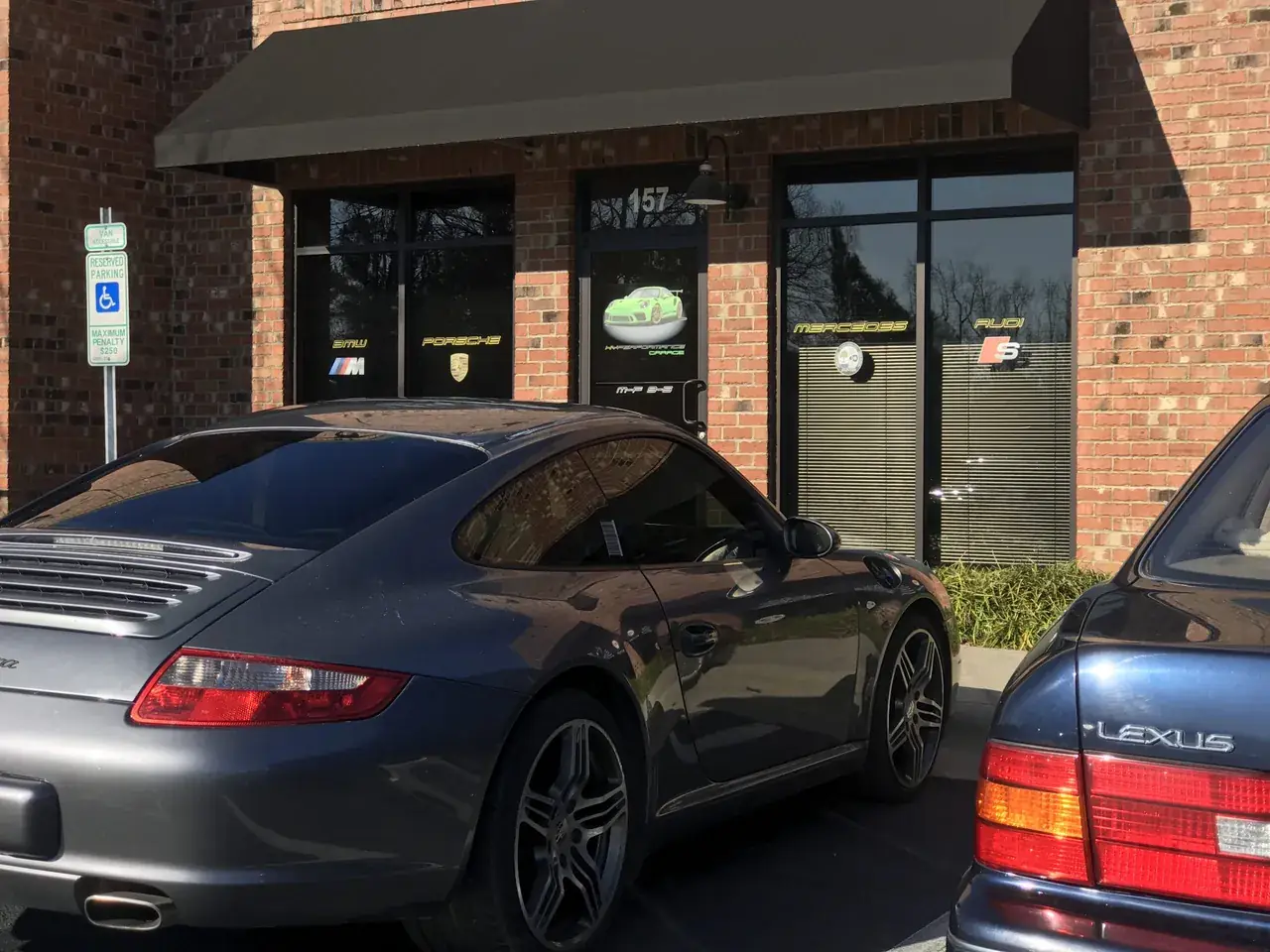 Blue Porsche 911 parked outside Hyperformance Garage in Apex, NC