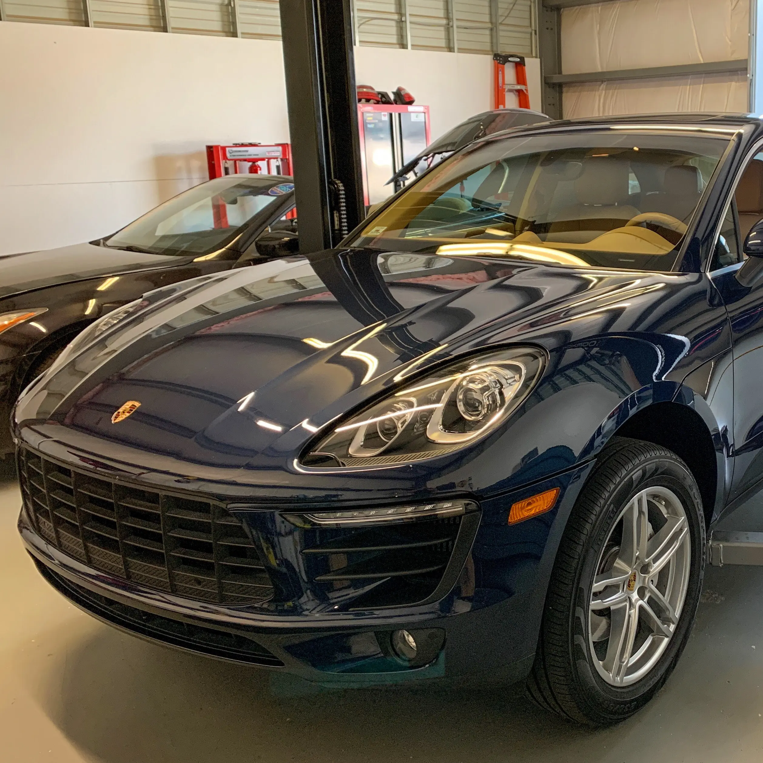 Car on a lift at Hyperformance Garage's Apex, NC shop
